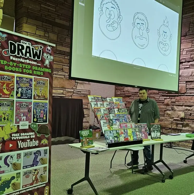 Kevin Coulston demonstrating drawing at a library event